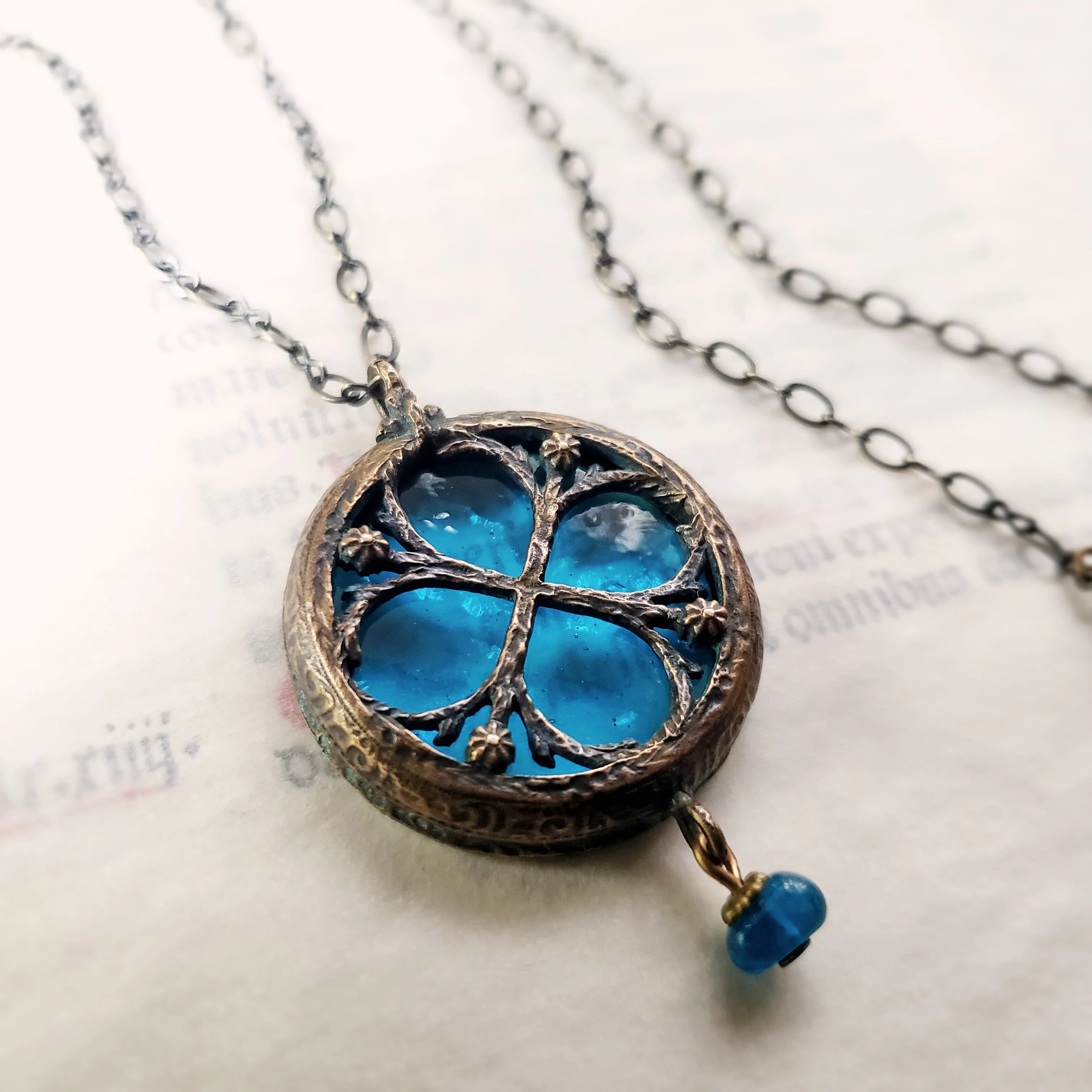 halcyon - floriated clover miracle window amulet